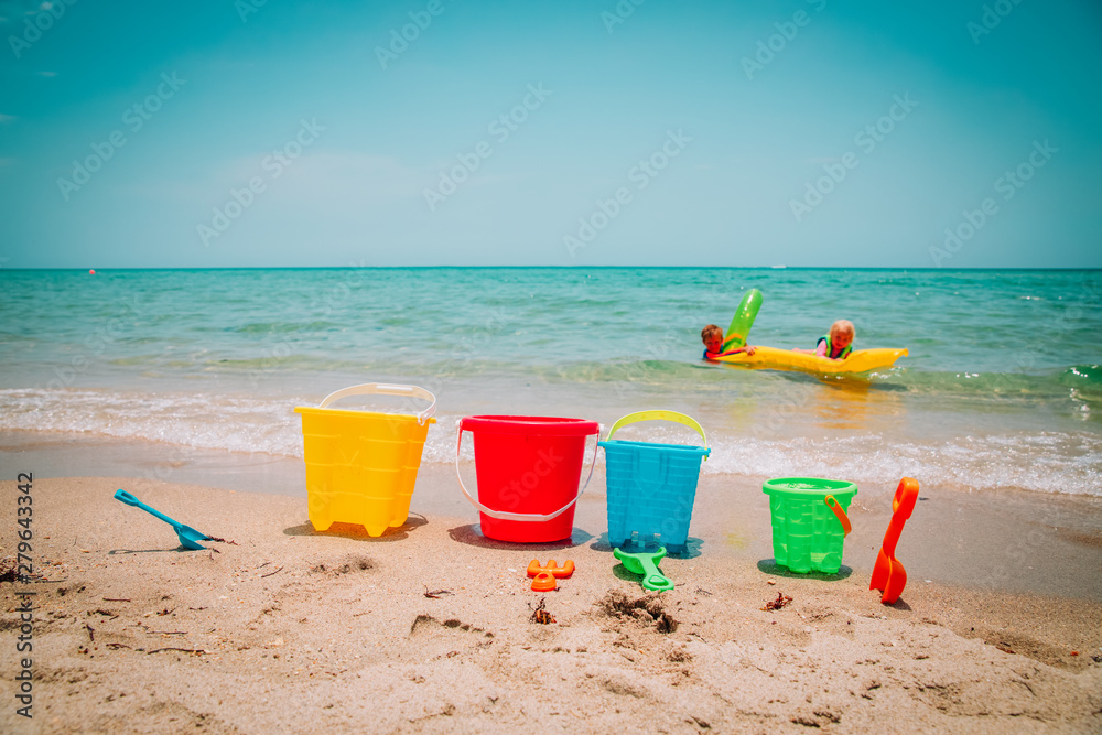 toys and kids play on beach vacation, family at sea toys and kids play on beach vacation, family at sea