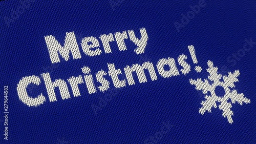 Christmas knitted background with snowflake on blue background