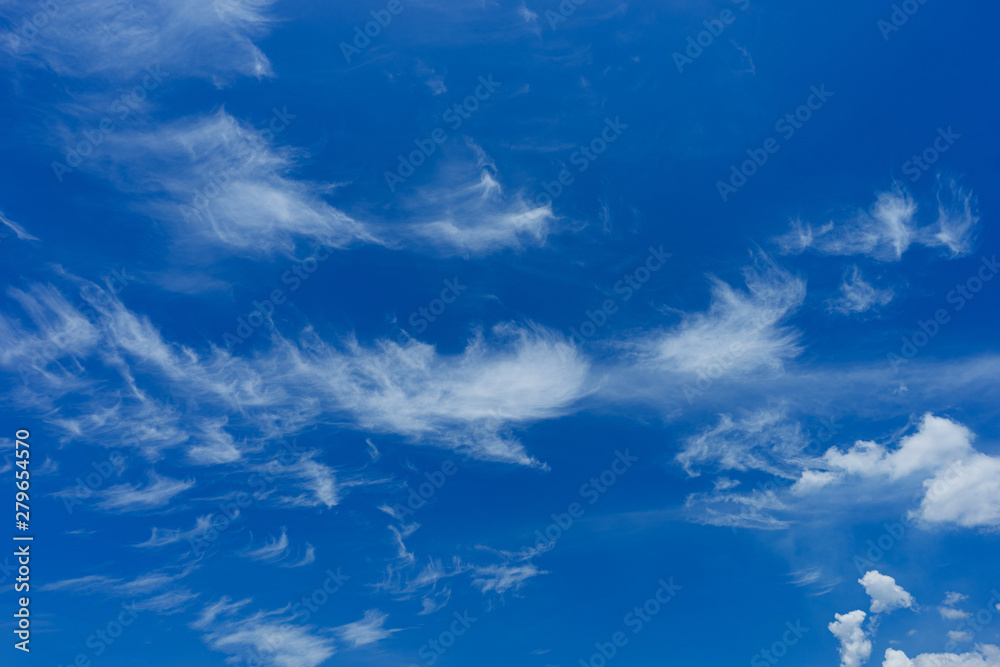 white fluffy clouds in the blue sky white fluffy clouds in the blue sky