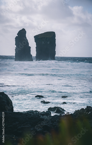 Aerial picture of wild rock formations in the middle of the open atlantic ocean next to Mosteiros, in Sao Miguel island, Azores, Portugal