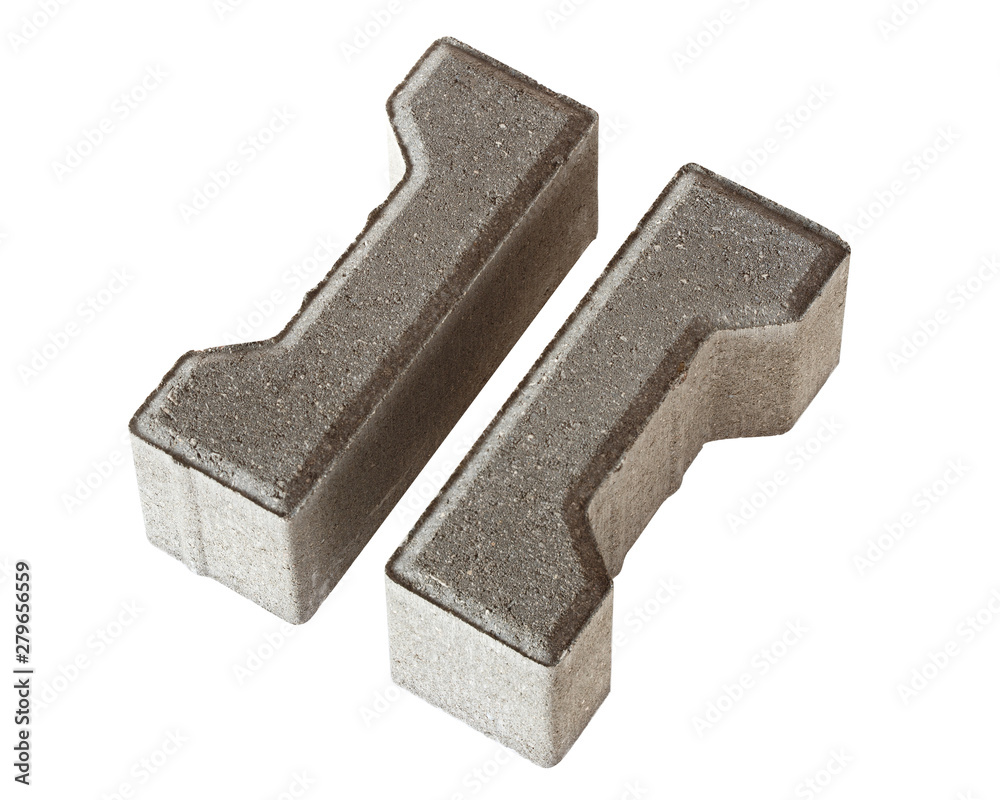 Half of the figured paving slabs are made for the convenience of the smooth edge of the pavement. Studio frame isolated on white background. Half of the figured paving slabs are made for the convenience of the smooth edge of the pavement. Studio frame isolated on white background.