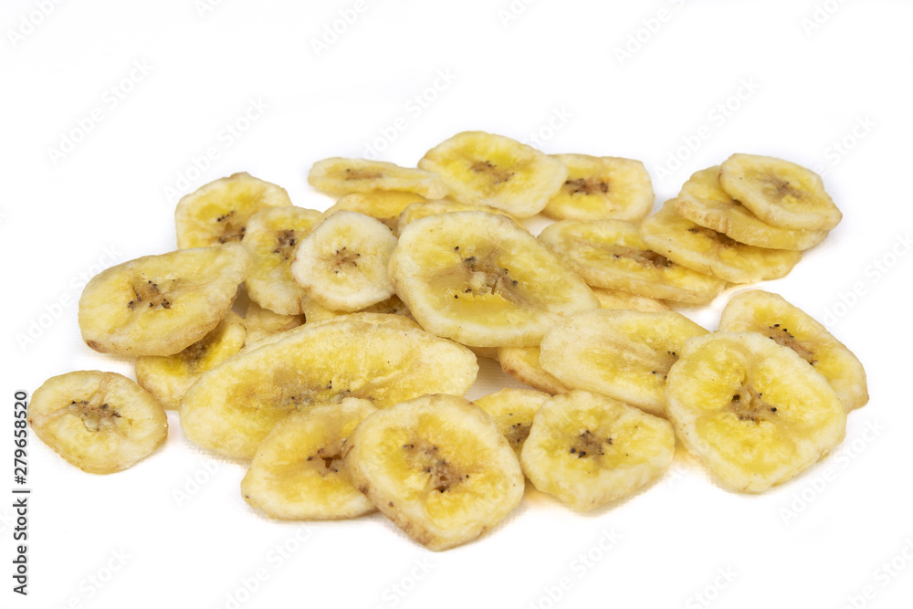 Dried banana pieces isolated on a white background. Dried banana pieces isolated on a white background.