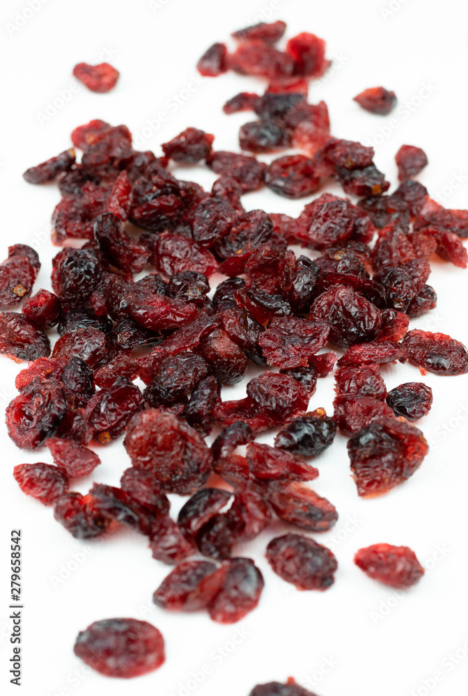 Dried red cranberries isolated on a white background. Dried red cranberries isolated on a white background.