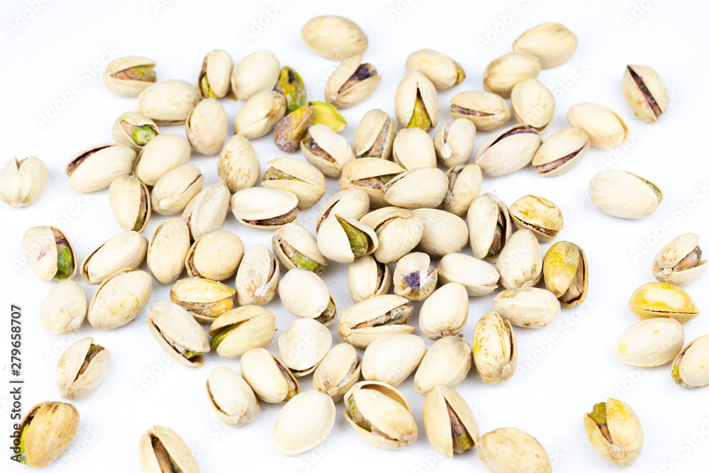Pistachio nuts isolated on a white background. Pistachio nuts isolated on a white background.