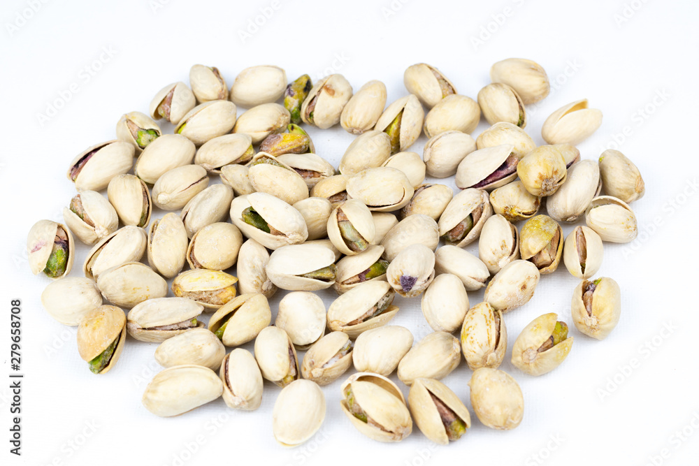Pistachio nuts isolated on a white background.