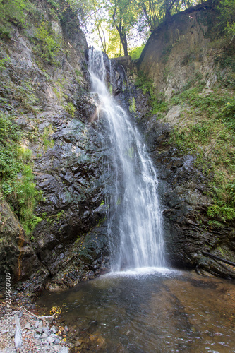 Pesegh Waterfall in the countryside of Varese, Northern Italy. Nobody is visible, only the waterfall and the river. photo