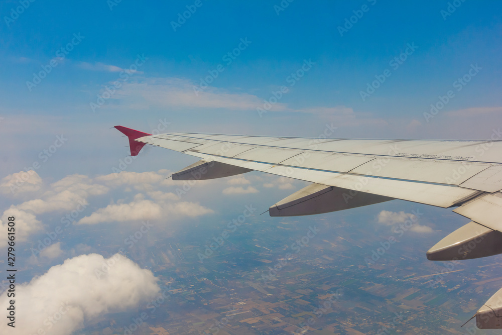 Fototapeta premium plane flew in bright sky