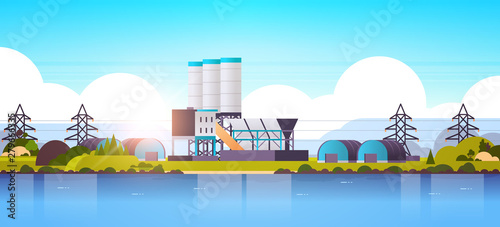 manufacturing factory buildings near river or sea industrial zone plant with pipes and chimney power station production technology concept horizontal flat