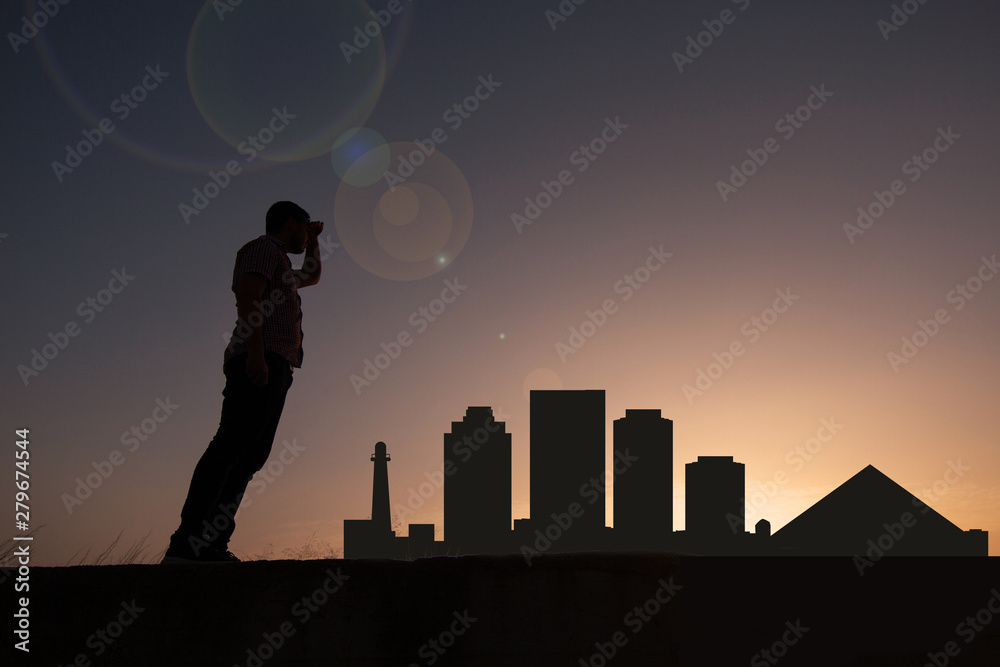traveler in front of long beach city skyline in united states