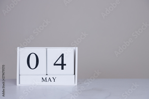 May Date Cube White Background