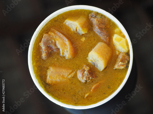 Sancocho soup. View from above. Disposable tableware. photo