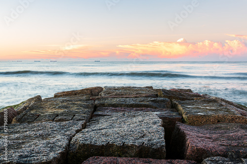 Foto Sunrise on coast of Galveston Island, Texas, view of ocean