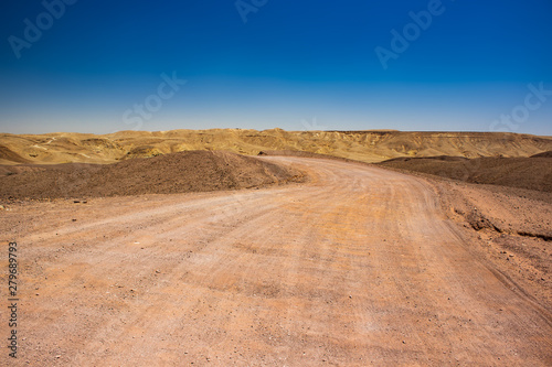 desert trail country side off road location with sand valley around and mountain background in Middle East hot natural environment 