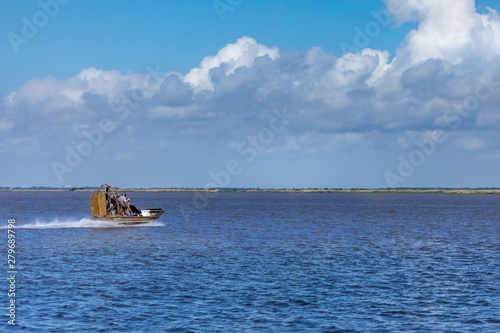 Fototapeta Naklejka Na Ścianę i Meble -  Airboat ride in the swamps of Texas, Gulf of Mexico