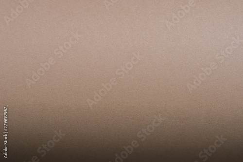 brown roller made with curved sheets of paper background texture