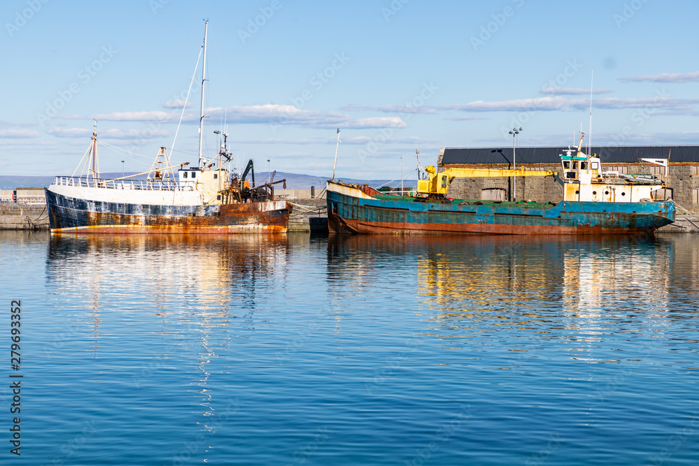 Ships in Kilronan village pier in Inishmore