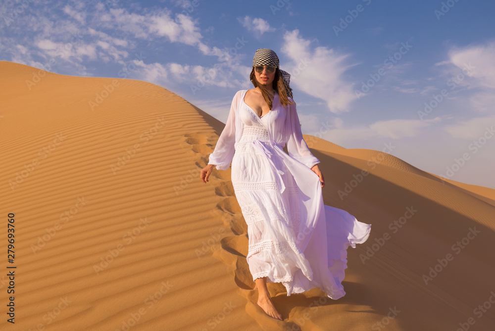 UAE. Woman in desert UAE. Woman in desert