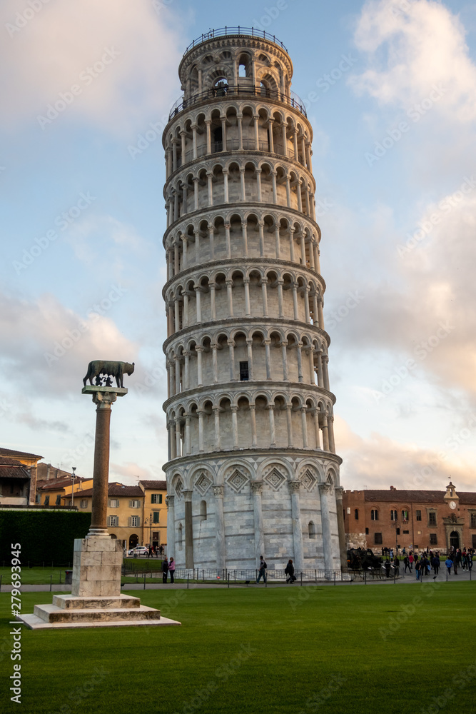 The Leaning Tower of Pisa, accompanied by the Lupa Capitolina. Tuscany, Italy