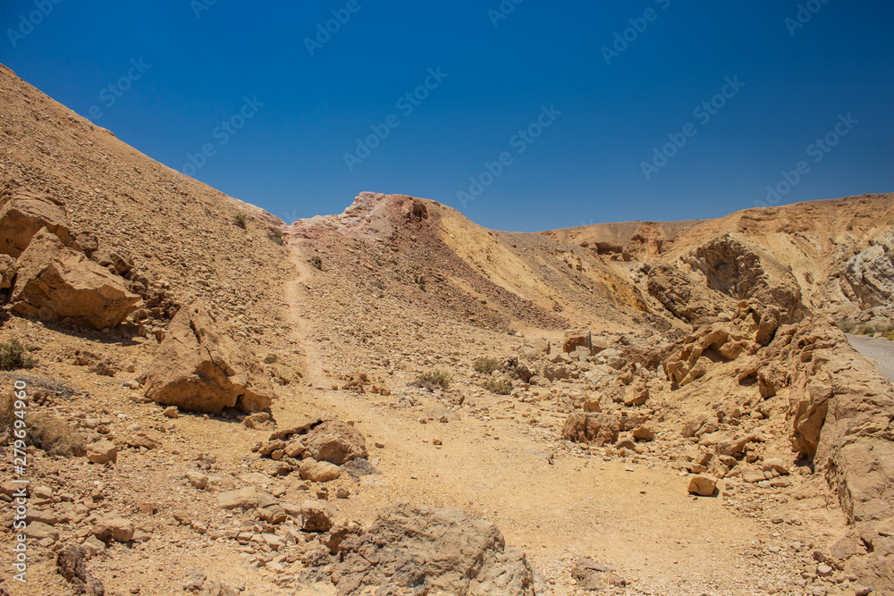desert mountain trail landscape in dangerous wilderness wasteland environment 