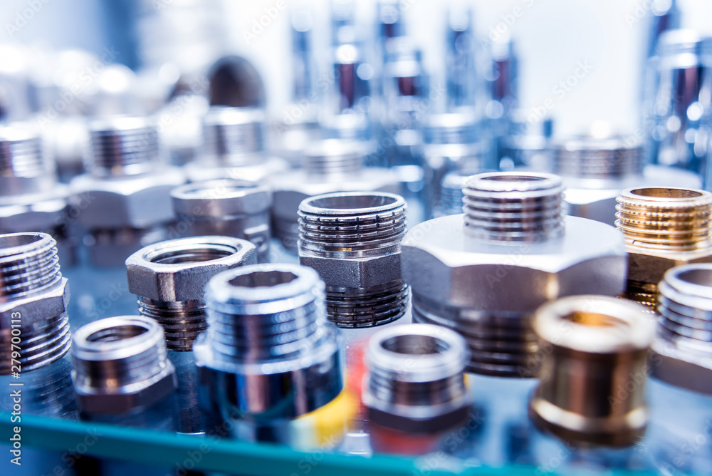 Hosepipe fittings on the table. Plumbing pipeline spare parts. Hosepipe fittings on the table. Plumbing pipeline spare parts.
