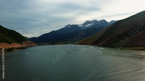 Wallpaper Mural Beautiful landscape view of Deer Creek Reservoir in Heber Valley Utah with speed boats and jet skis on the lake on a cloudy summer day. Torontodigital.ca