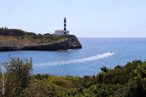 rock window with lighthouse - Porto Colom Mallorca Balearic Islands Spain