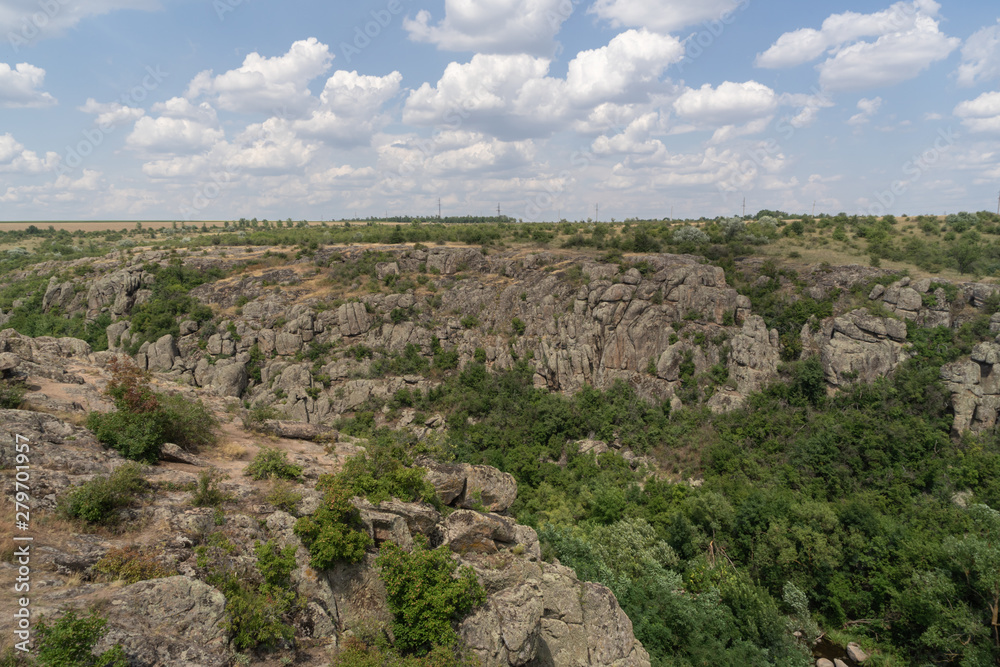 Large granite canyon. Village Aktove. Ukraine. Beautiful stone landscape.