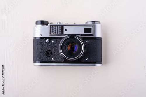 Old vintage retro single silver photo film camera copy space top view flat lay on white background