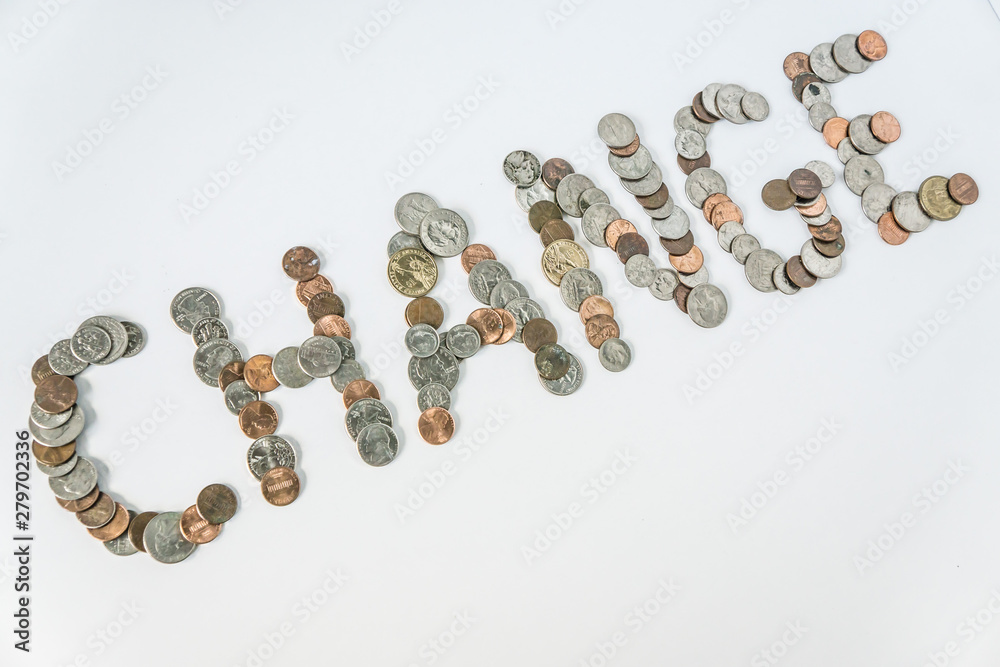 Coins isolated on solid white background spelling the word Change