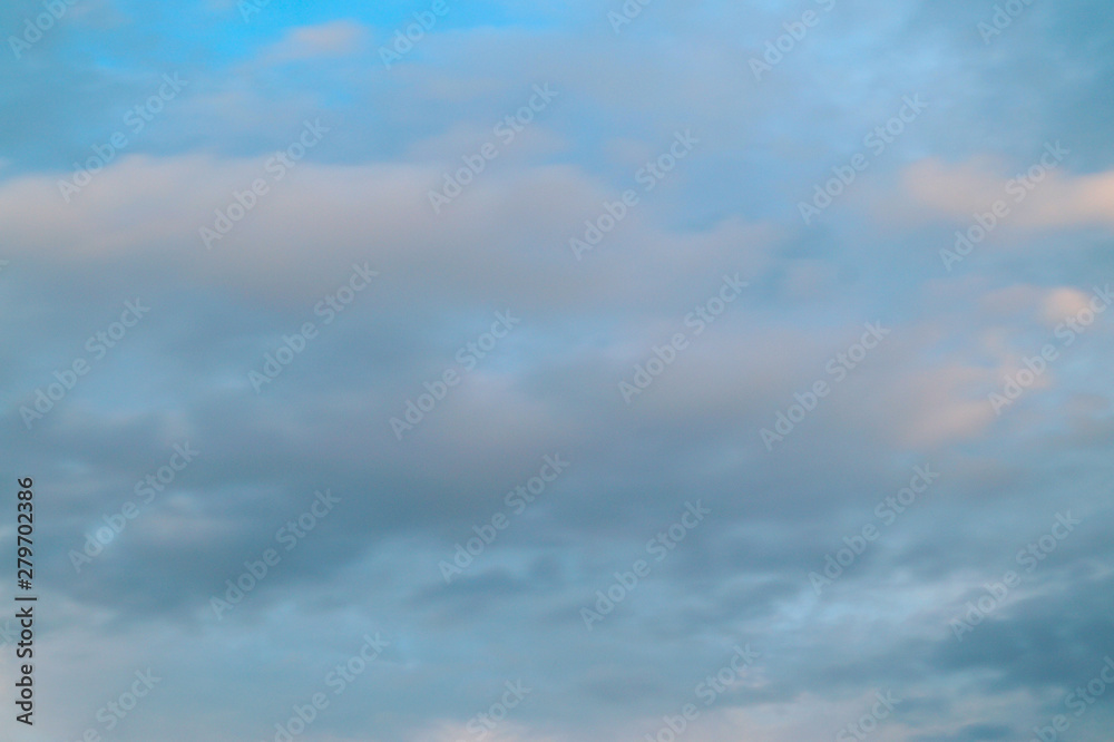 Large white cumulus clouds on a blue sky for background or ecology or nature.