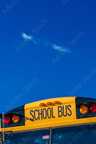 School bus and blue sky, Stowe, Vermont, USA