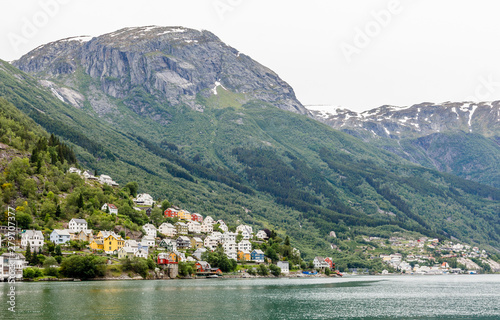 Colorful norwegian residential houses on the hill of Sorfjord, Odda, Hordaland county, Norway photo