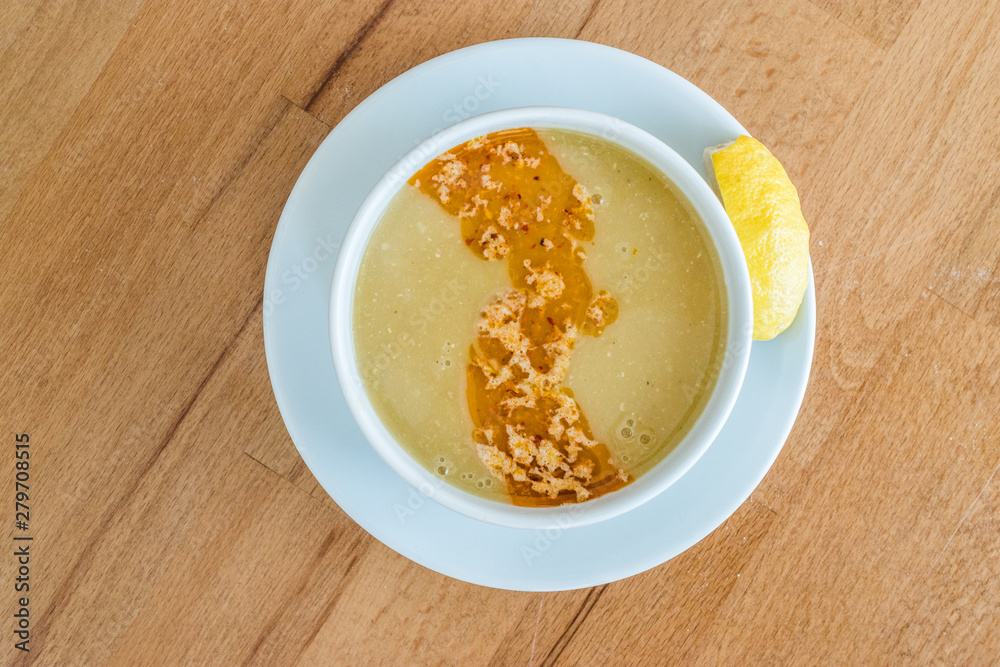Turkish Lentil Soup with fried butter sauce / Mercimek Corbasi at Restaurant. Turkish Lentil Soup with fried butter sauce / Mercimek Corbasi at Restaurant.