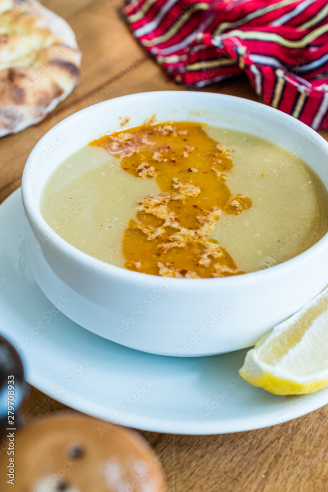 Turkish Lentil Soup with fried butter sauce / Mercimek Corbasi at Restaurant. Turkish Lentil Soup with fried butter sauce / Mercimek Corbasi at Restaurant.