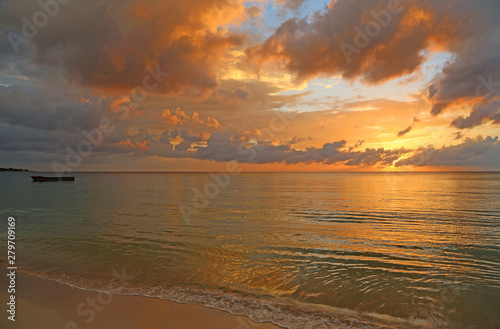 Fototapeta Naklejka Na Ścianę i Meble -  Landscape with a boat at sunset - Jamaica