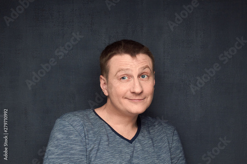 Εκτύπωση καμβά Portrait of genial and dreamy man imagining something pleasant