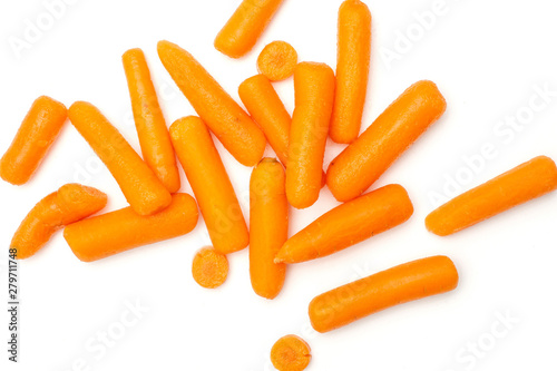 Lot of whole peeled orange baby cut carrot flatlay isolated on white background photo