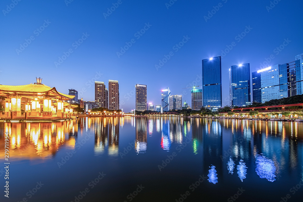 Naklejka premium Night skyline of CBD building in Nanhai District, Foshan City, Guangdong Province, China