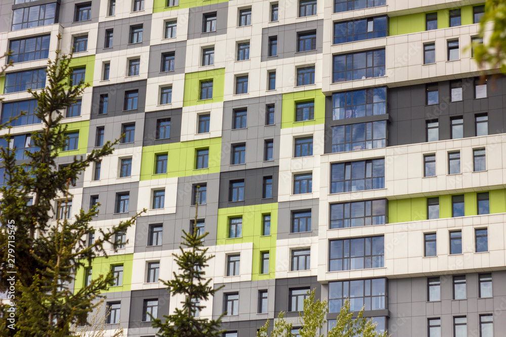 facade with windows of a modern high-rise building facade with windows of a modern high-rise building