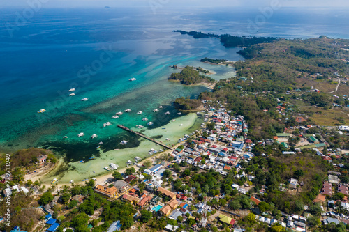 Aerial drone view of the tropical island of Malapascua in the Cebu region of the Philippines photo