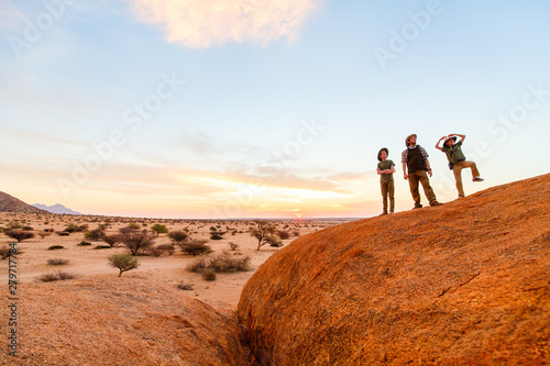 Family hiking in Spitzkoppe Namibia