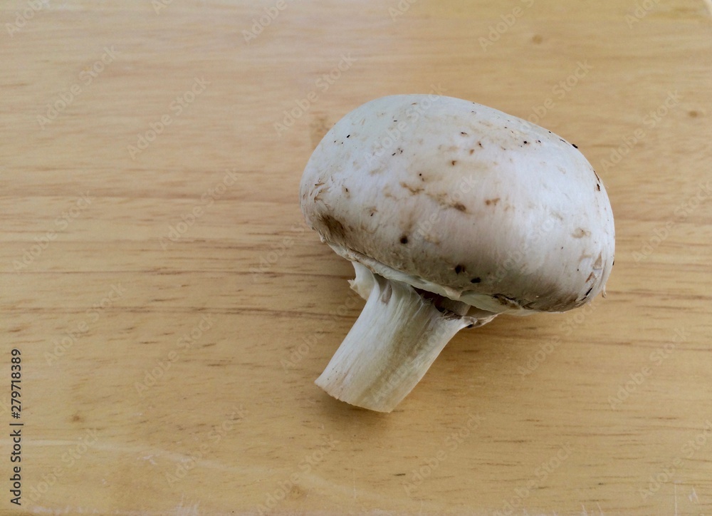 fresh mushroom on a chopping board fresh mushroom on a chopping board