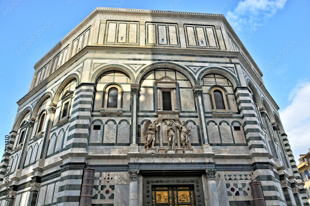 The Baptistery is one of the oldest buildings in Florence Italy. 4th century. Iconic octagonal basilica with striking marble facade, known for its bronze doors and mosaic ceiling. Italy, Florence The Baptistery is one of the oldest buildings in Florence Italy. 4th century. Iconic octagonal basilica with striking marble facade, known for its bronze doors and mosaic ceiling. Italy, Florence