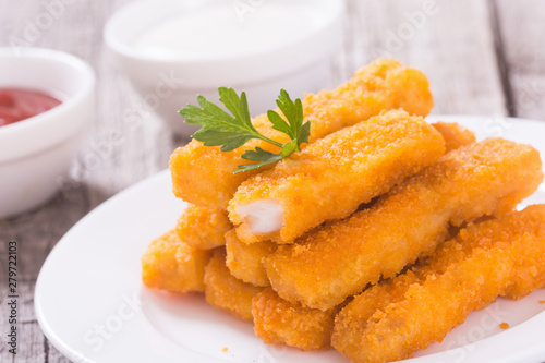 Photography Fried fish sticks ( fingers ) or chicken nugget