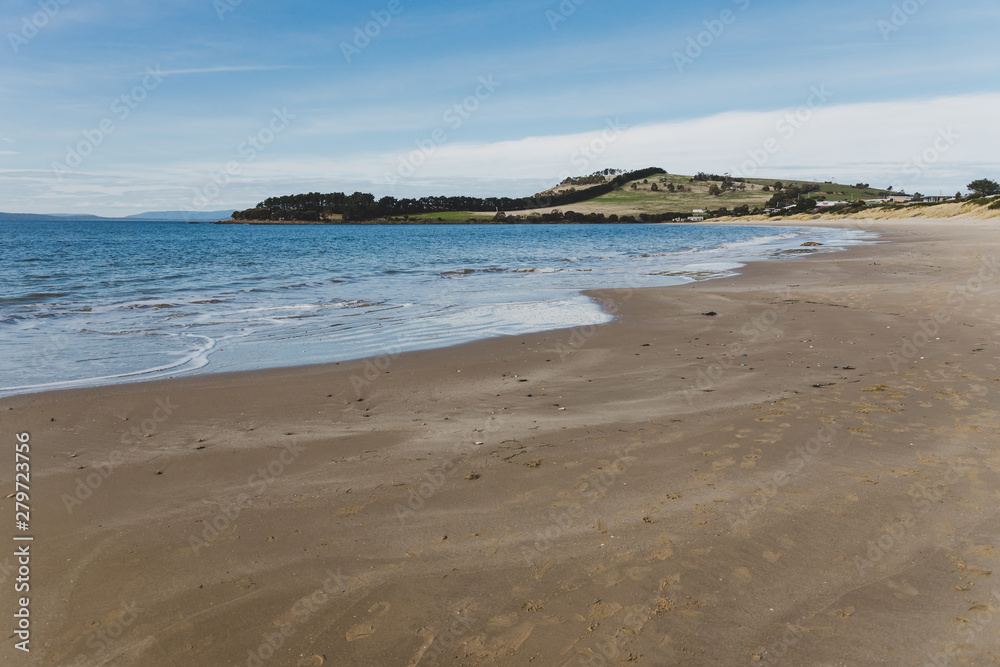 sunny Australian beach in Cremorne, Tasmania