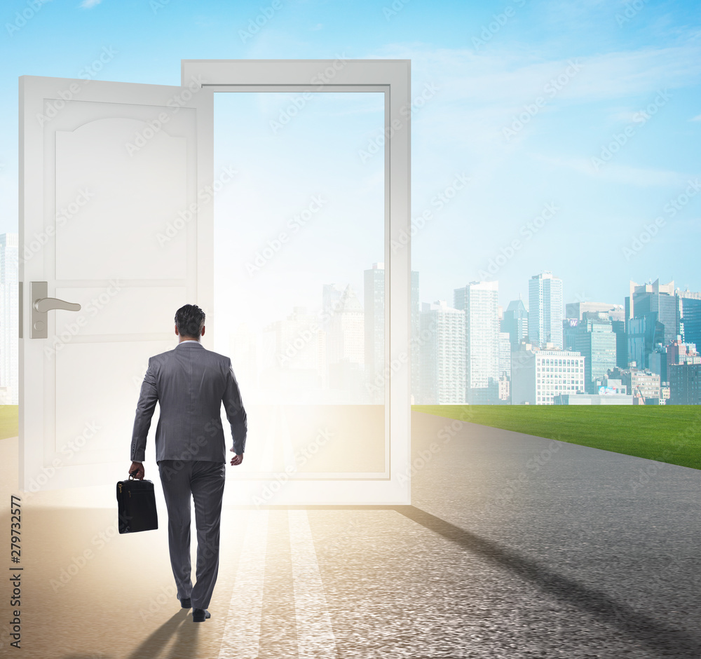 Fototapeta premium Businessman in front of door in business opportunities concept