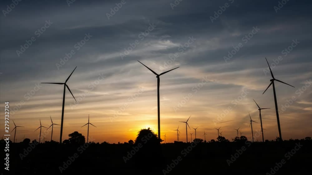 Timelapse 4k of Wind turbines of save Energy save world in video 4k format. wind turbines at sunrise with beautiful clouds Timelapse 4k of Wind turbines of save Energy save world in video 4k format. wind turbines at sunrise with beautiful clouds