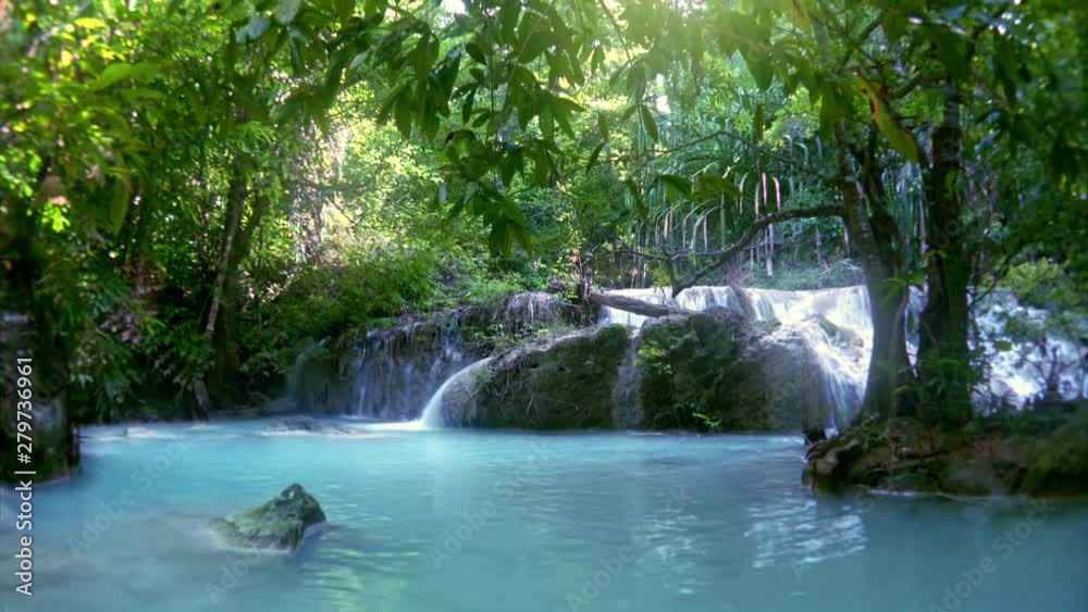 Spectacular view of Erawan cascade waterfall. Kanchanaburi National Park, Thailand. Original audio, sound of rushing water. Beautiful fantasy. Azure river. Lush tropical vegetation of sunny jungle Spectacular view of Erawan cascade waterfall. Kanchanaburi National Park, Thailand. Original audio, sound of rushing water. Beautiful fantasy. Azure river. Lush tropical vegetation of sunny jungle