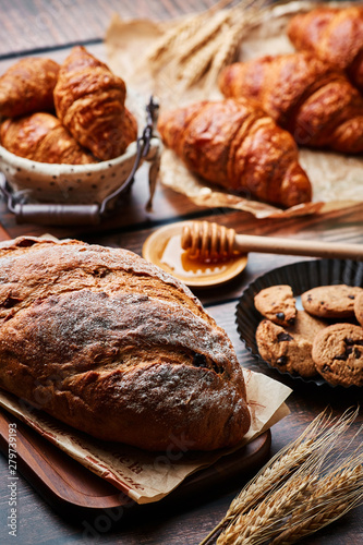 Miscellaneous delicious pastry on the wooden table