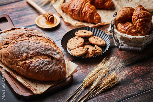 Miscellaneous delicious pastry on the wooden table